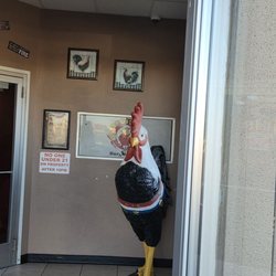 Rooster's Barn & Grill - The head rooster greeting you.