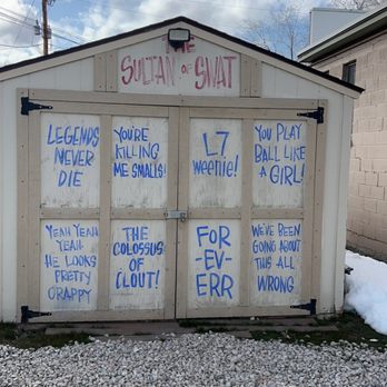 Hook And Ladder - a garage with graffiti on it - Burgers Near Me - Salt Lake City, Utah