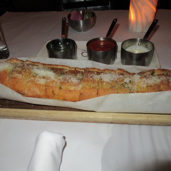 Lavo - Foot long garlic bread with 3 dipping sauces - Italian Near Me - Las Vegas, Nevada Lavo - Foot long garlic bread with 3 dipping sauces - Italian Near Me - Las Vegas, Nevada