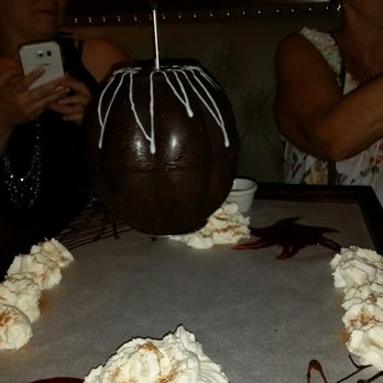 Uncle Julio's - $25 Pinata chocolate ball w fruit n churros inside dipped in caramel/homemade whip cream. - Mexican Near Me - Orlando, Florida