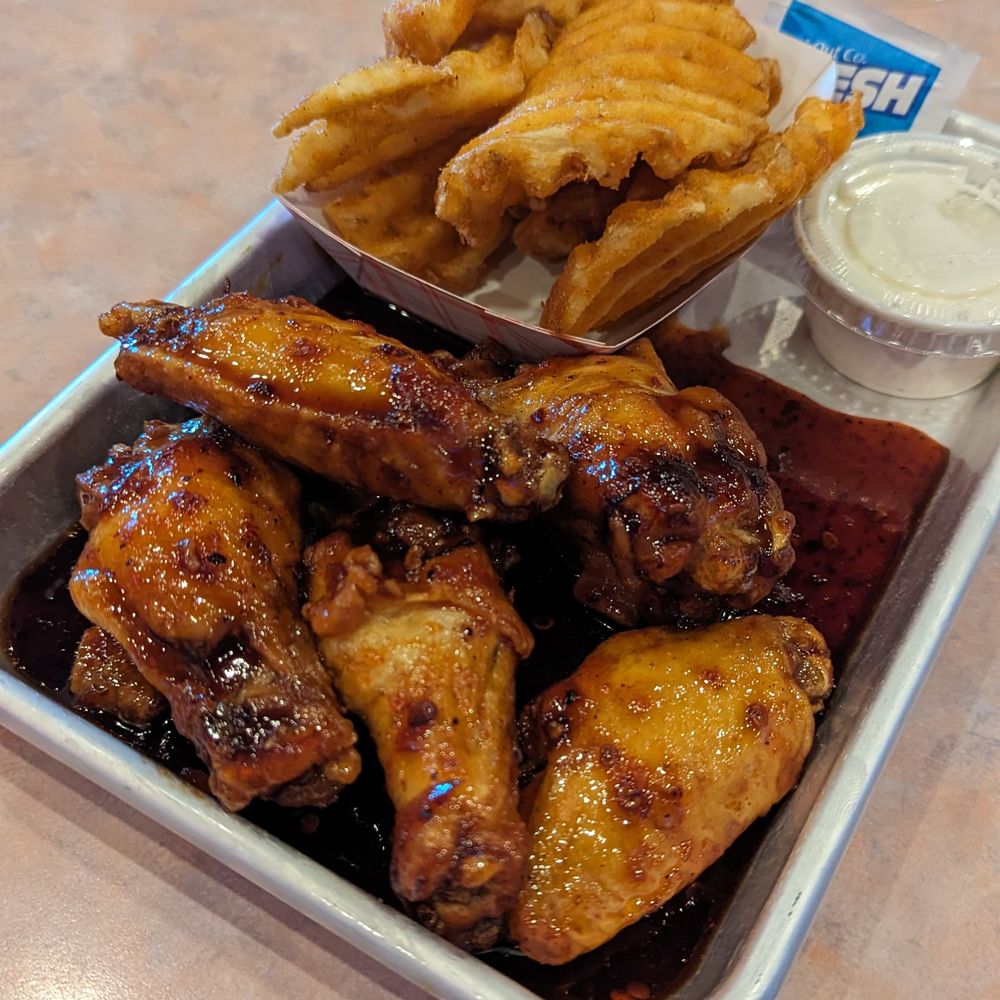 Waldo's Wings - Hot bourbon glaze with the excellent waffle fries. - Burgers Near Me - Winston Salem, North Carolina Waldo's Wings - Hot bourbon glaze with the excellent waffle fries. - Burgers Near Me - Winston Salem, North Carolina