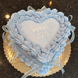 Chocolate Cake with buttercream frosting for a Gemini birthday girl. Chocolate Cake with buttercream frosting for a Gemini birthday girl.