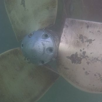 Harbor Crew SD - Zinc Replacement of this three blade propeller from a Sail Boat. This is a 63 mm cone zinc. - Boat Repair Near Me Harbor Crew SD - Zinc Replacement of this three blade propeller from a Sail Boat. This is a 63 mm cone zinc. - Boat Repair Near Me