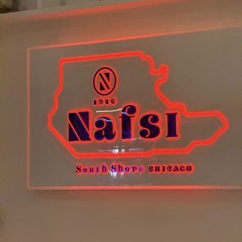 Nafsi - This and artificial flowers is the only decor. - New American Near Me - Chicago, Illinois