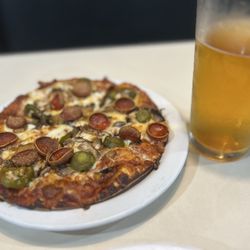 Round Table Pizza - Personal pizza and tall cold beer, the perfect pair