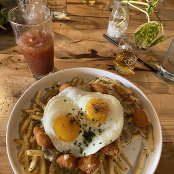 Wolf's Ridge Brewing - Poutine with a Bloody Mary and a Day Break backer - Breweries Near Me - Columbus, Ohio Wolf's Ridge Brewing - Poutine with a Bloody Mary and a Day Break backer - Breweries Near Me - Columbus, Ohio