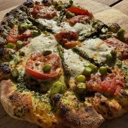 Sourdough crust, mozzarella cheese, asparagus, orange fermented chutney, pesto, tomatoes with marigold & calendula petals!!!