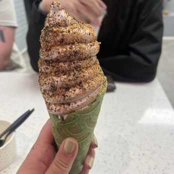 Softspot - Vanilla chocolate swirl with Oreo, biscoff, and toffee in a matcha cone - Desserts Near Me - Chantilly, Virginia