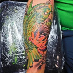 Ballistic Ink Tattoo Studio - Green koi full forearm