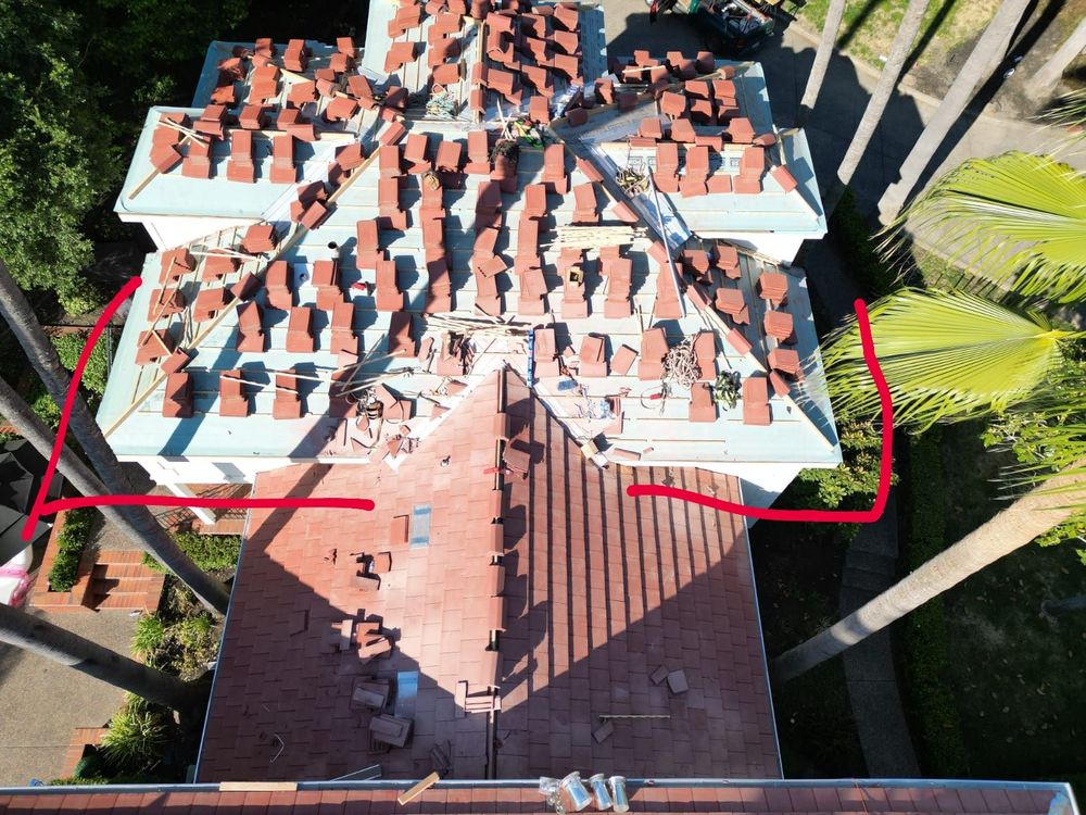 Slide of RR Alvarez Roofing