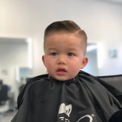 The Modern Man - Comb over fade by Jeremy for the little man.