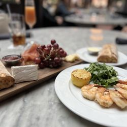 3 Arts Club Cafe at RH Chicago - Grilled shrimp and Prosciutto and Delice Board