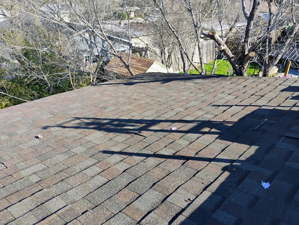 Slide of Mad Pelican Roofing