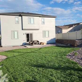 MTI Custom Landscapes - a backyard with a fire pit - Landscaping Near Me MTI Custom Landscapes - a backyard with a fire pit - Landscaping Near Me