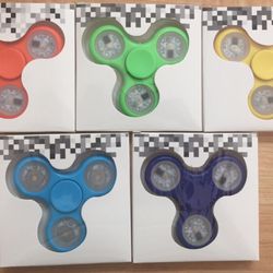 DZ Vapor Shop - Led light multi color fidget spinner. Only 4.99