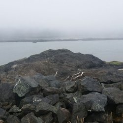 Coquille River North Jetty - Piles of Tupper Rock forms the jetty