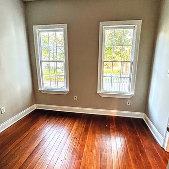 Olde Savannah Hardwood Flooring - a room with two windows - Flooring Near Me - Savannah, Georgia Olde Savannah Hardwood Flooring - a room with two windows - Flooring Near Me - Savannah, Georgia