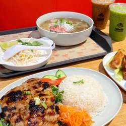Non La Express - All Day Combo for Two: Pork Chop Rice, Phở Special, Spring Rolls (4pcs), Vietnamese Iced Coffee, and Thai Green Milk Tea