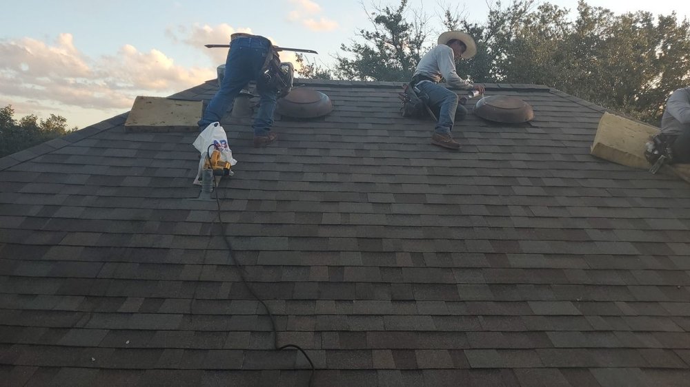 Slide of Trinity Roofing and Restoration