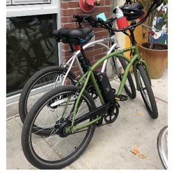Cactus E-Bikes - Bikes parked in front of Good pie pizza.