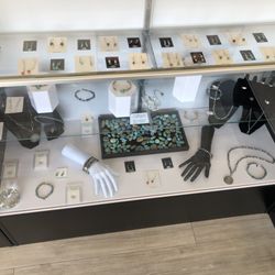 Sandia Gold & Silver - Display case of jewelry