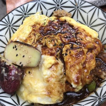 Tanuki Restaurant - Omurice - not the traditional form we were expecting, but the egg was so creamy! - Japanese Near Me - Markham, Ontario Tanuki Restaurant - Omurice - not the traditional form we were expecting, but the egg was so creamy! - Japanese Near Me - Markham, Ontario