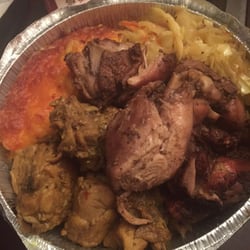 Jerk and curry chicken mac and cabbage