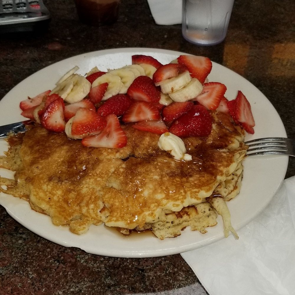 George's Diner & Cafe - Pancakes with bananas and strawberries - Diners Near Me - Bronx, New York George's Diner & Cafe - Pancakes with bananas and strawberries - Diners Near Me - Bronx, New York