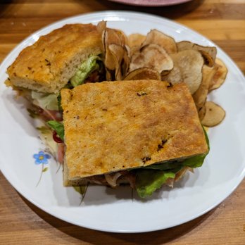 Bombolo - Muffuletta. $20. Serrano ham, duck salami, mortadella, comte, giardiniera, lettuce, focaccia. - New American Near Me - Chapel Hill, North Carolina