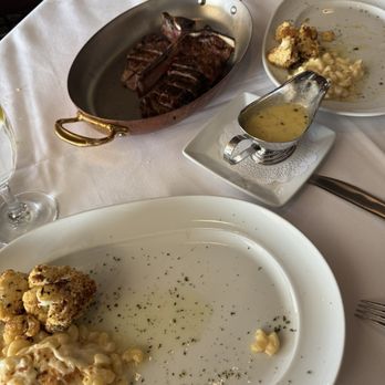Mastro's Steakhouse - We got the porterhouse steak, which is in New York rib, and a fillet, I definitely prefer the fillet, but they were both very good - Steakhouses Near Me - Columbus, Ohio