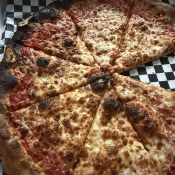 Rocket Pie - The bambino. Looking a little bit crisp on that upper left. - Pizza Near Me - Canmore, Alberta