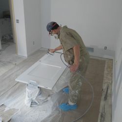 Jamie Dorsey Painting - Painting doors in a large remodel using door deckers