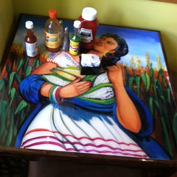 Carlos Cantina - All tables are painted like this, cool - Mexican Near Me - Iron Mountain, Michigan