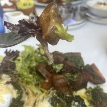 Hau Tree - Forkful of house salad and breakfast potatoes. - Seafood Near Me - Honolulu, Hawaii Hau Tree - Forkful of house salad and breakfast potatoes. - Seafood Near Me - Honolulu, Hawaii