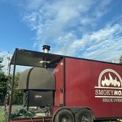Smoky Mozz Pizza - View of the back of their food truck (which faces the parking lot of Frank's Produce & Greenhouse).