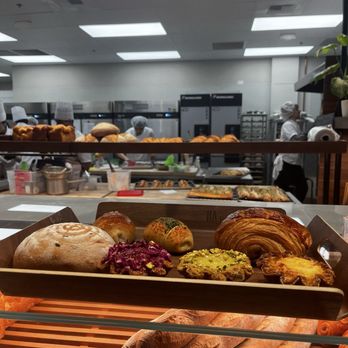 BA Bakehouse - Purple rice bun, rose egg tart, pistachio egg tart, sourdough egg tart, chocolate croissant, salt bread (regular and herb) - Bakeries Near Me - Bellevue, Washington