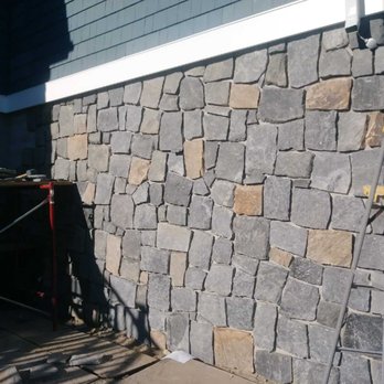 GMX Landscaping - the side of a house with a stone wall - Tree Services Near Me - Toms River, New Jersey GMX Landscaping - the side of a house with a stone wall - Tree Services Near Me - Toms River, New Jersey