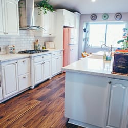 2nd Avenue Design Kitchen & Bath Remodeling - Kitchen remodel with 2nd avenue design - refinished cabinets to white, new countertops, farm sink, new hardware.
