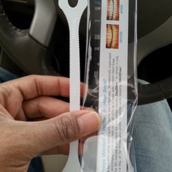 Tongue scraper.. Dont look like much, but its highly effective..
