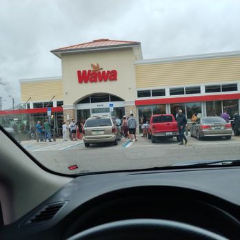 Wawa - People arriving And waiting on the store to open - Gas Stations Near Me - Zephyrhills, Florida