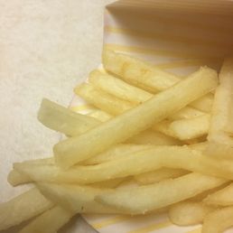 french fries on a paper plate