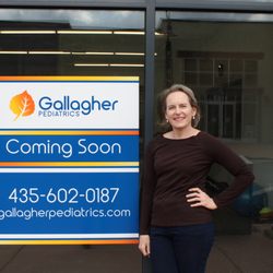Gallagher Eileen, MD - Gallagher Pediatrics - Dr. Gallagher in front of our Newpark office location. 1154 Center Drive, Suite D240 Park City, UT 84098