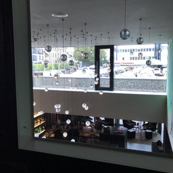SAKS - Cutouts in the wall looking down on the bar area - Hotels Near Me - Kaiserslautern, RP
