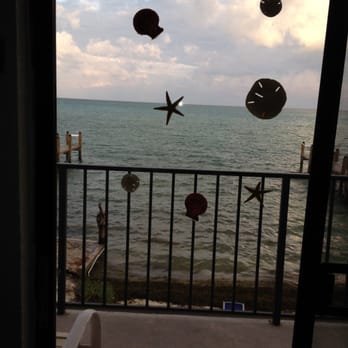 Edgewater Lodge - Real seashell decorations on our sliding glass door! - Hotels Near Me - Long Key, Florida