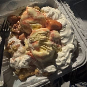 The Funnel House - One tiny scoop of strawberries for this giant funnel cake - Desserts Near Me - Huntington Beach, California The Funnel House - One tiny scoop of strawberries for this giant funnel cake - Desserts Near Me - Huntington Beach, California