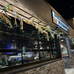 Tacconelli’s Pizzeria - Front is inviting and there is a parking lot; enter at side door.