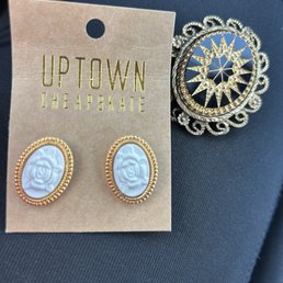 Hallmark flower earrings and a Victorian brooch. Hallmark flower earrings and a Victorian brooch.