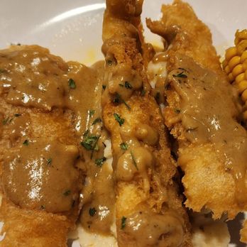 Bluewater Grill - Catfish w/spicy creole sauce on mashed potatoes and corn.  This isn't on the menu.  I saw all these things and ordered a hodge-podge. - Seafood Near Me - Columbus, Georgia