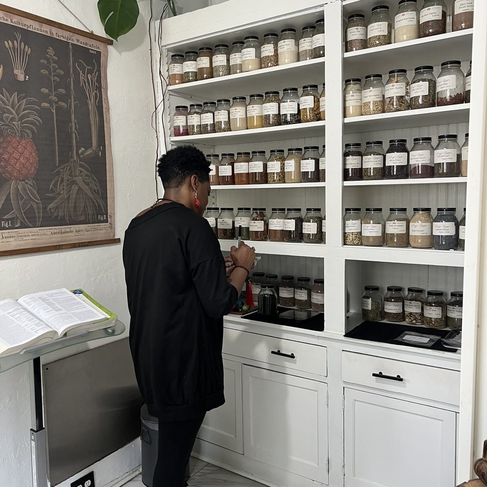 Lucyja Hygge - Maria mixing herbs for tea - Spiritual Shop Near Me - Memphis, Tennessee Lucyja Hygge - Maria mixing herbs for tea - Spiritual Shop Near Me - Memphis, Tennessee