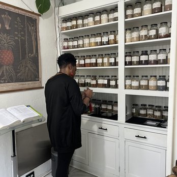 Lucyja Hygge - Maria mixing herbs for tea - Spiritual Shop Near Me - Memphis, Tennessee Lucyja Hygge - Maria mixing herbs for tea - Spiritual Shop Near Me - Memphis, Tennessee